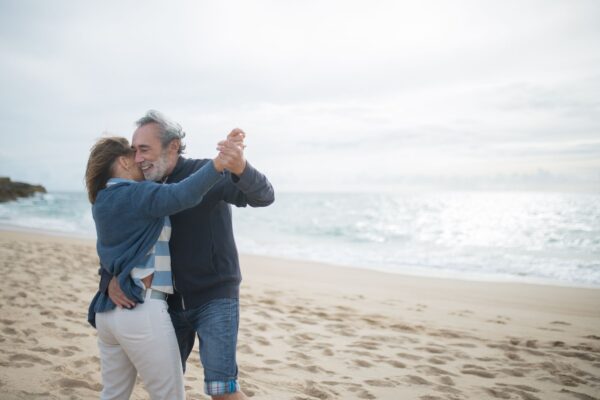 couple dancing at the beach
